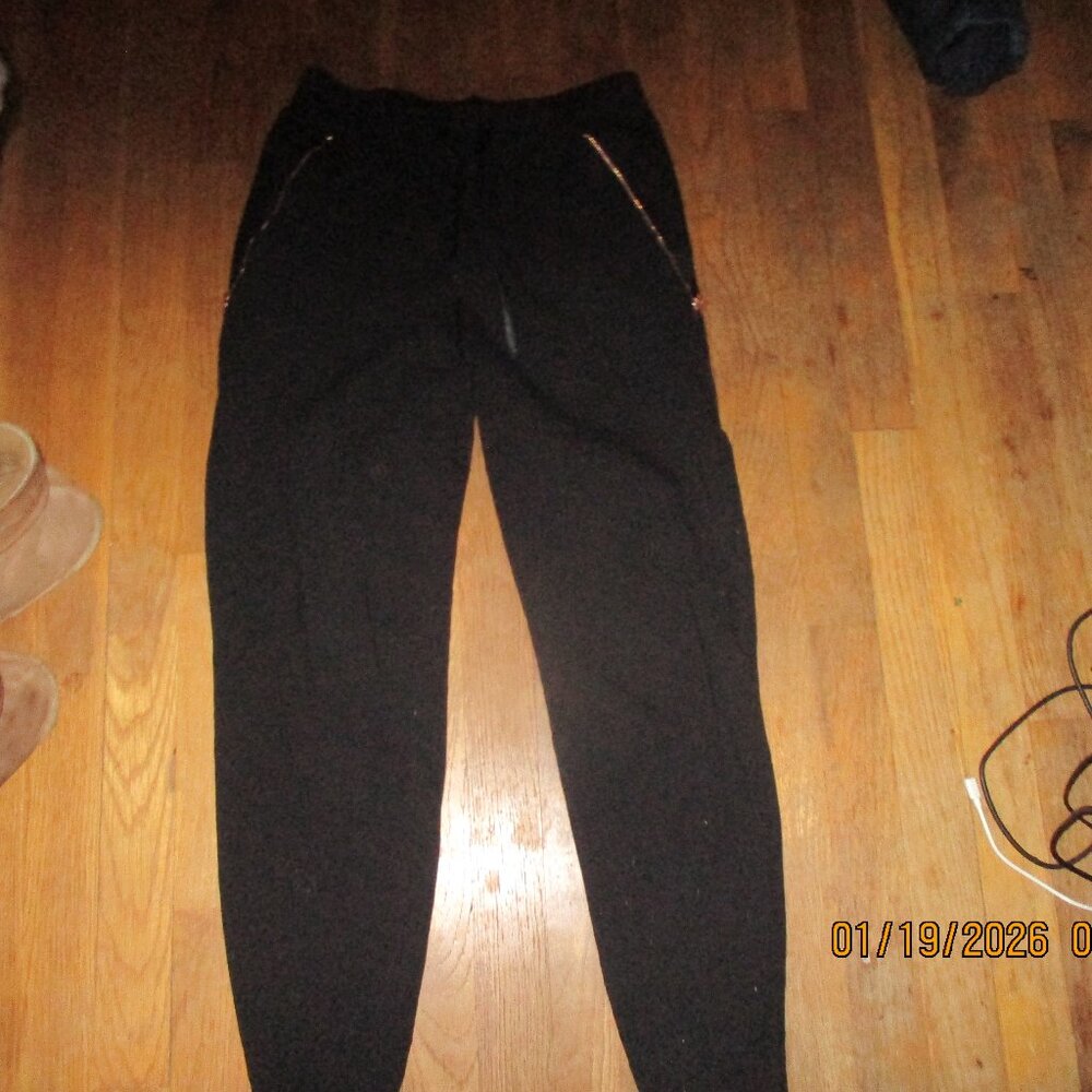 lime and vne baclk sweat pants with gold fancy zippers small worn once